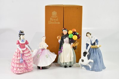 Lot 1317 - ROYAL DOULTON; a collection of four figures...