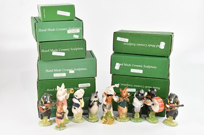 Lot 1328 - BESWICK; a pig band comprising two...