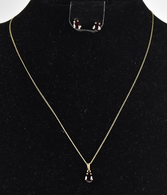 Lot 1209 - A 9ct yellow gold dainty chain with ring clasp,...