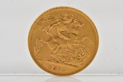 Lot 1088 - A George V half sovereign, 1914.