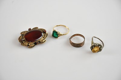 Lot 393 - A 9ct yellow gold dress ring set with an...