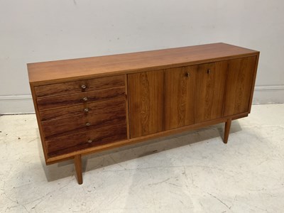 Lot 7 - ATTRIBUTED TO VANSON; a mid century teak...