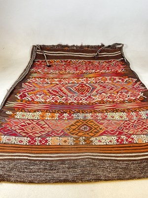 Lot 658 - A Turkish Kilim floor sack. 140cm x 105cm