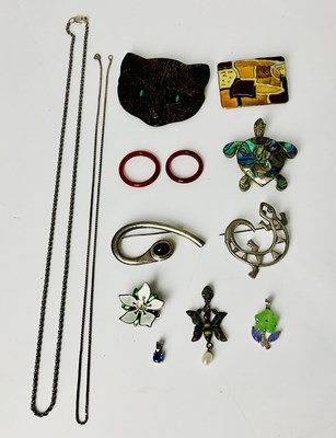 Lot 210 - A Lea Stein cat brooch, length 6cm, a modern...