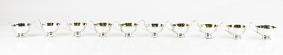 Lot 430 - A group of ten Danish silver punch cups,...