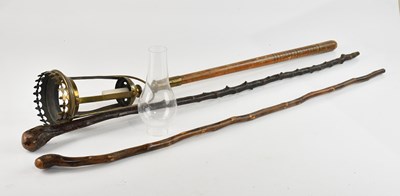 Lot 316 - A portable oil lamp, height 84cm, together...