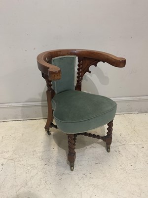 Lot 29 - A Victorian oak bow back library chair on...