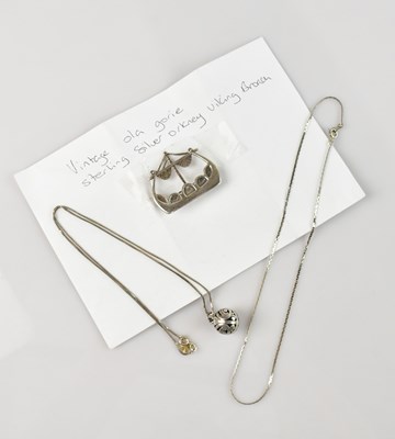 Lot 404 - OLA GORIE; a sterling silver Viking longboat...
