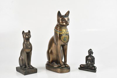Lot 1210 - A bronzed seated Buddha and two Egyptian style...