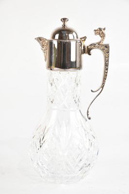 Lot 515 - A silver plate mounted cut glass claret jug,...
