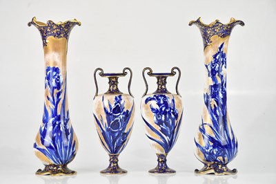 Lot 1022 - ROYAL DOULTON; a pair of 'Blue Iris' pattern...
