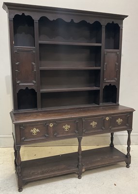 Lot 115 - A reproduction oak dresser, with a plate rack...