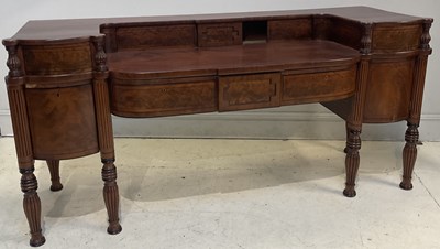 Lot 18 - A Regency mahogany sideboard with an...