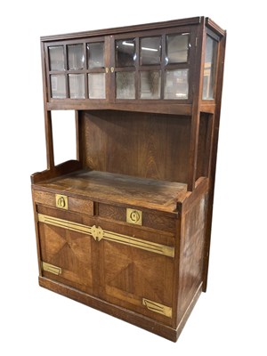 Lot 4 - An Arts and Crafts oak and brass mounted...
