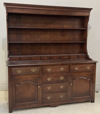 Lot 6 - A 19th century oak dresser, with boarded plate...