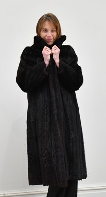Lot 1326 - NORTHERN EXPORT FUR; a full length dark brown...
