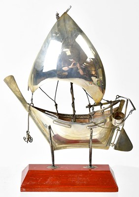 Lot 560 - A Chinese silver model of a junk, stamped...
