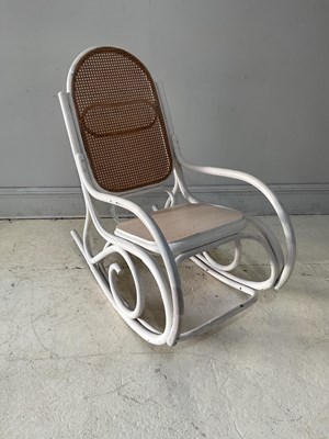 Lot 120 - A large white painted bentwood rocking chair.