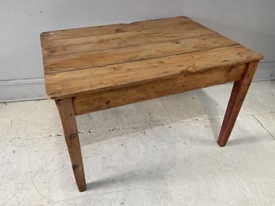 Lot 106 - A rustic pine table, height 73cm, length 121cm,...