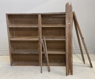 Lot 107 - A pitch pine bookcase with six adjustable...