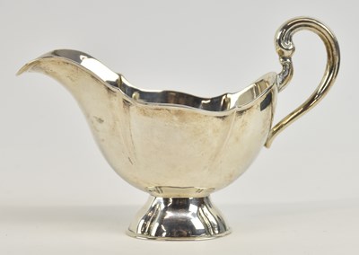 Lot 1175 - A Continental silver (830/1000) small cream...