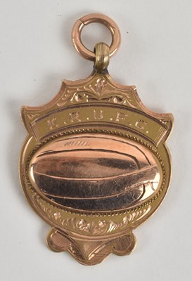 Lot 1202 - A 9ct rose gold prize fob for KRDFC, with a...