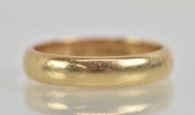 Lot 1296 - A 9ct yellow gold band ring, size M, approx...