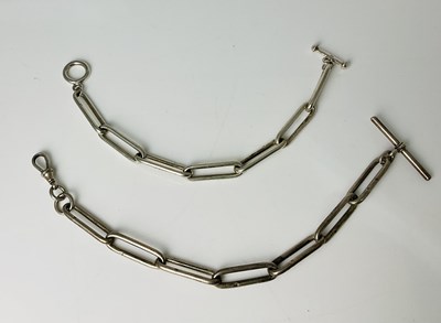 Lot 217 - Two silver watch chains, lengths 22cm and 23cm,...