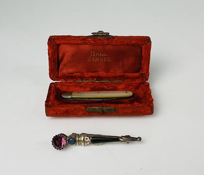 Lot 211 - A Scottish silver brooch modelled as a dirk,...