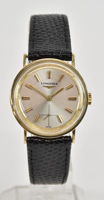 Lot 1507 - LONGINES; a gentleman's 14K yellow gold...