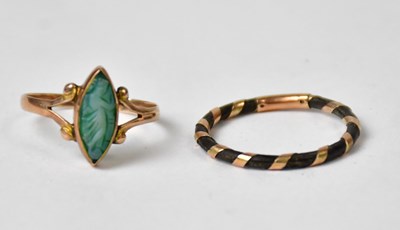 Lot 837 - A 9ct gold ring set with marquise cut blue...