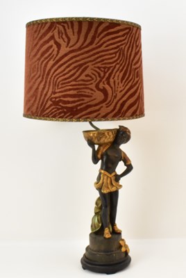 Lot 93 - A reproduction carved wood Blackamoor figured...