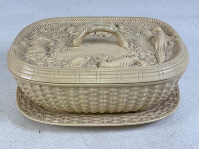 Lot 100 - A large Victorian creamware game pie dish with...