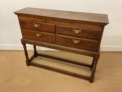 Lot 290 - An oak four drawer chest on later stand, width...