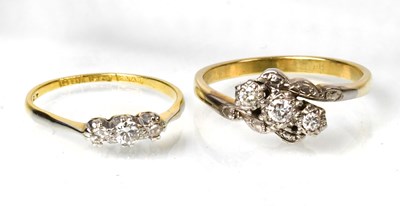 Lot 812 - Two 18ct gold rings, on set with three...