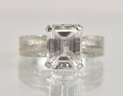 Lot 1270 - A 14K white gold dress ring, with prong set...