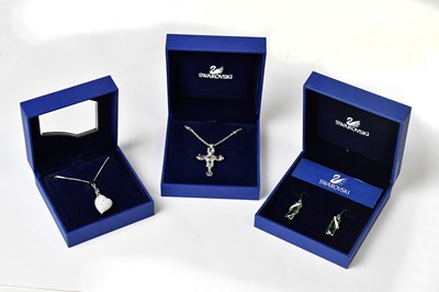Lot 996 - SWAROVSKI; three boxed items, comprising a...