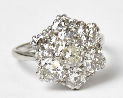 Lot 774 - A platinum ring set with seven old European...