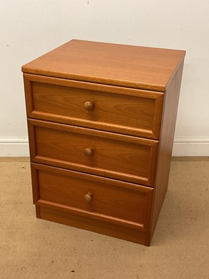 Lot 317 - G PLAN; an Albany teak three drawer side chest,...