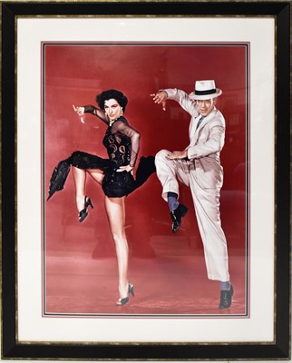 Lot 567 - A large photographic print of Syd Charisse and...