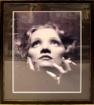 Lot 568 - MARLENE DIETRICH; a large black and white...