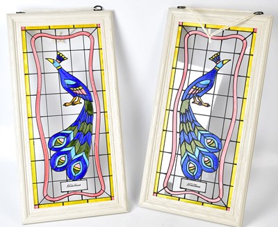 Lot 60 - A small pair of reproduction stained glass...