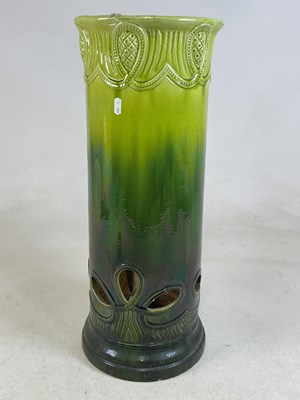Lot 91 - BURMANTOFTS; a large majolica green glazed...