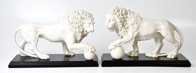 Lot 296 - A pair of contemporary composite Medici lions,...