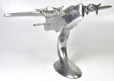 Lot 294 - An Art Deco style polished alloy four-engined...