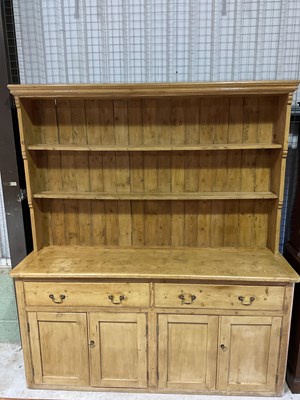 Lot 245 - A large Victorian pine dresser, with boarded...
