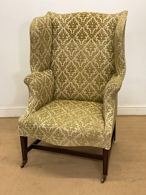 Lot 281 - A late 19th century mahogany framed wingback...