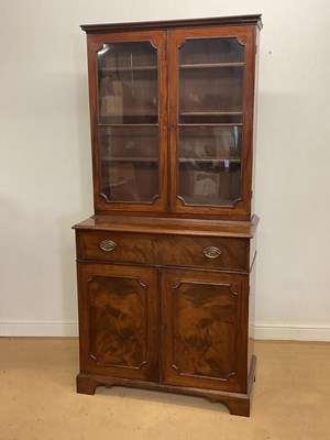 Lot 320 - A late George III mahogany bookcase on...