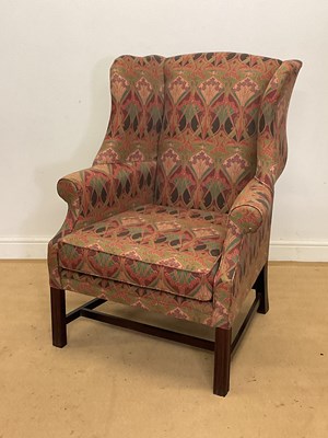 Lot 272 - A mahogany framed wingback armchair.