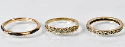 Lot 845 - Three rings comprising a 9ct gold diamond half...